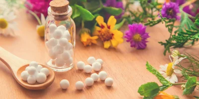 homeopathy-small-jars-herbal-extract-selective-focus-nature